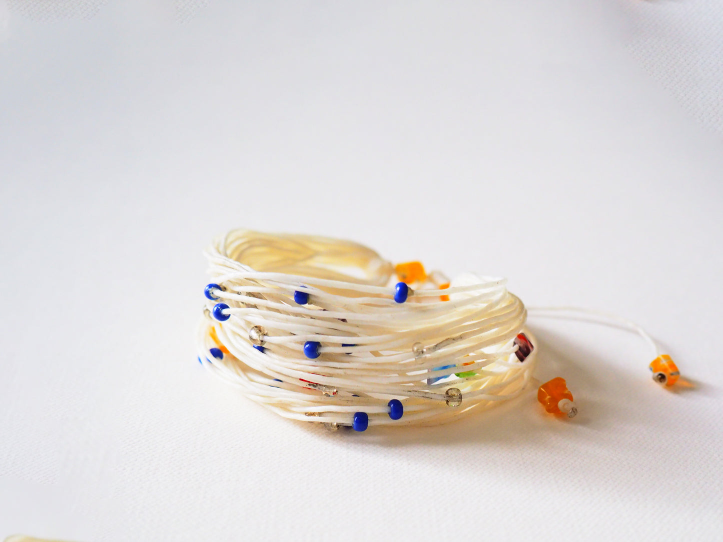 Silk Cord and Mixed Beads Bracelet by JANI