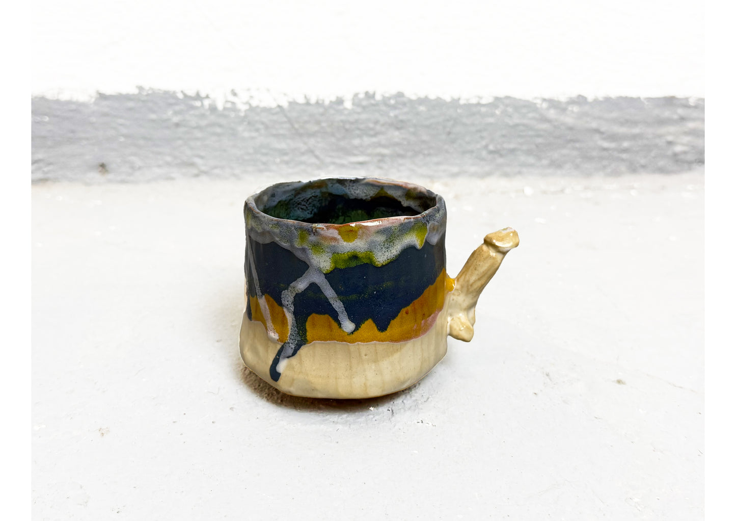 Ceramic D Cup Blue-Yellow-Beige by MAXIMILIAN GUTMAIR