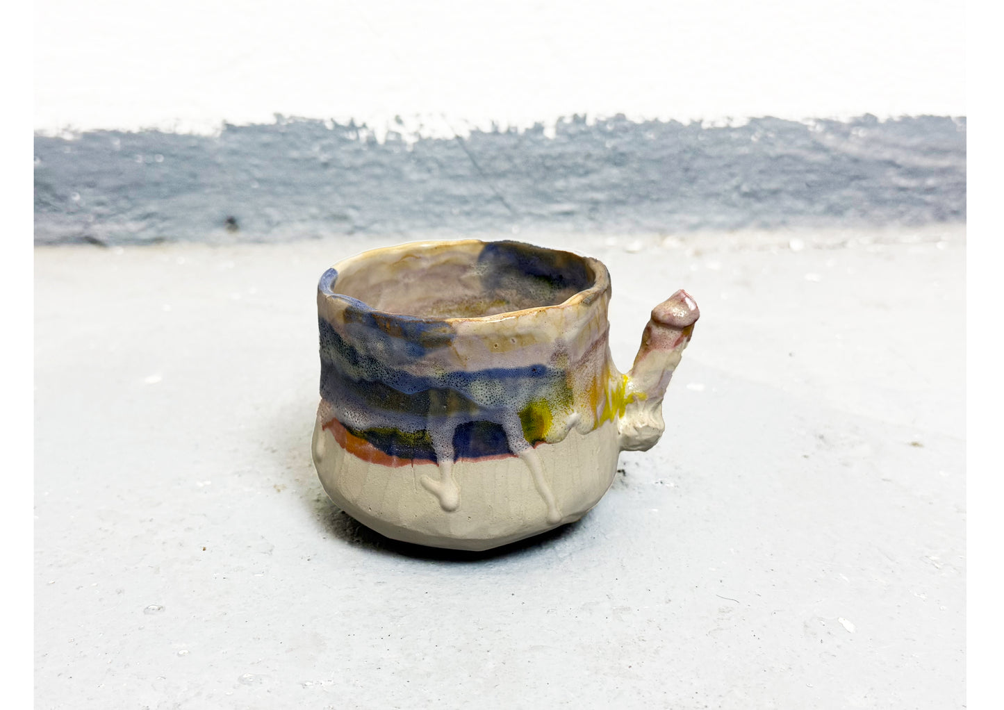 Ceramic D Cup Blue-Yellow-Pink-White by MAXIMILIAN GUTMAIR