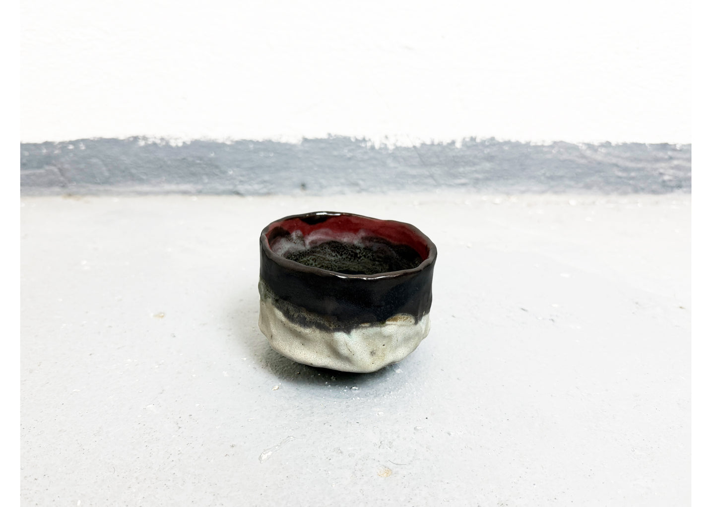 Ceramic Cup Black-White-Red by MAXIMILIAN GUTMAIR